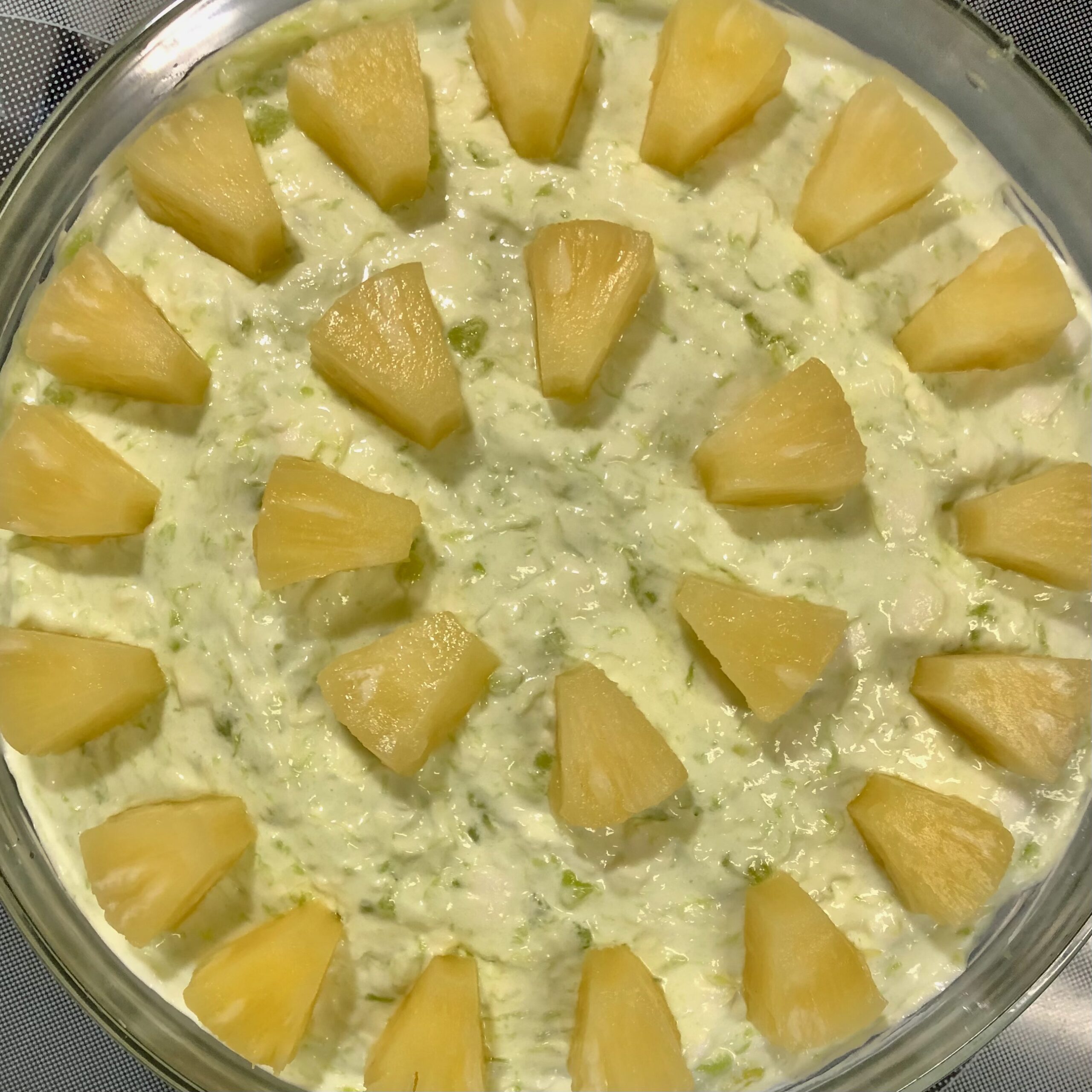 After it has been mix and chilled then added pineapples to the top for decoration