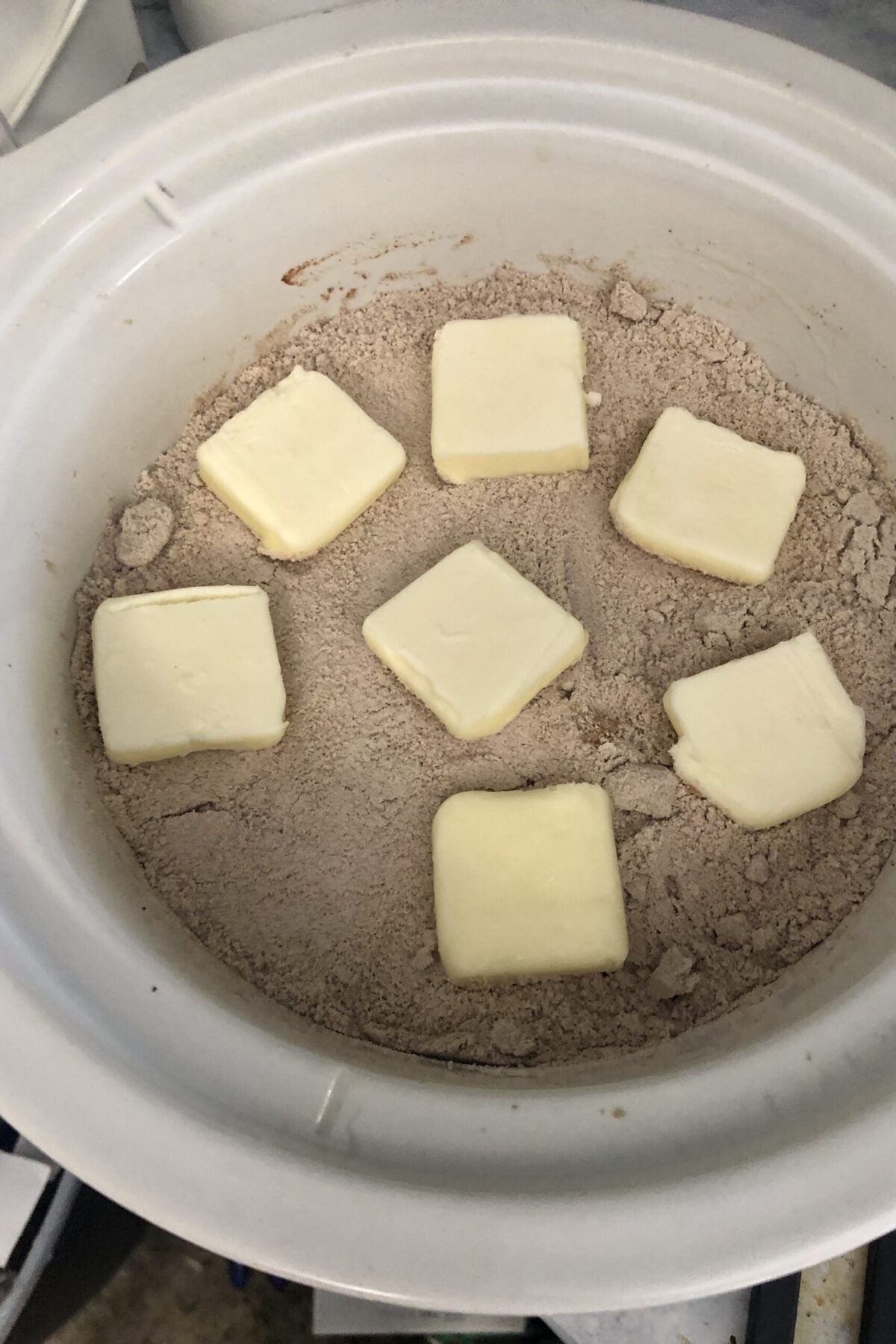 There are seven pieces of butter even though we say 8 as we didn't cut them small enough but it will still working on it. Every thing has been added to the crock pot now ready to plug it in and get started