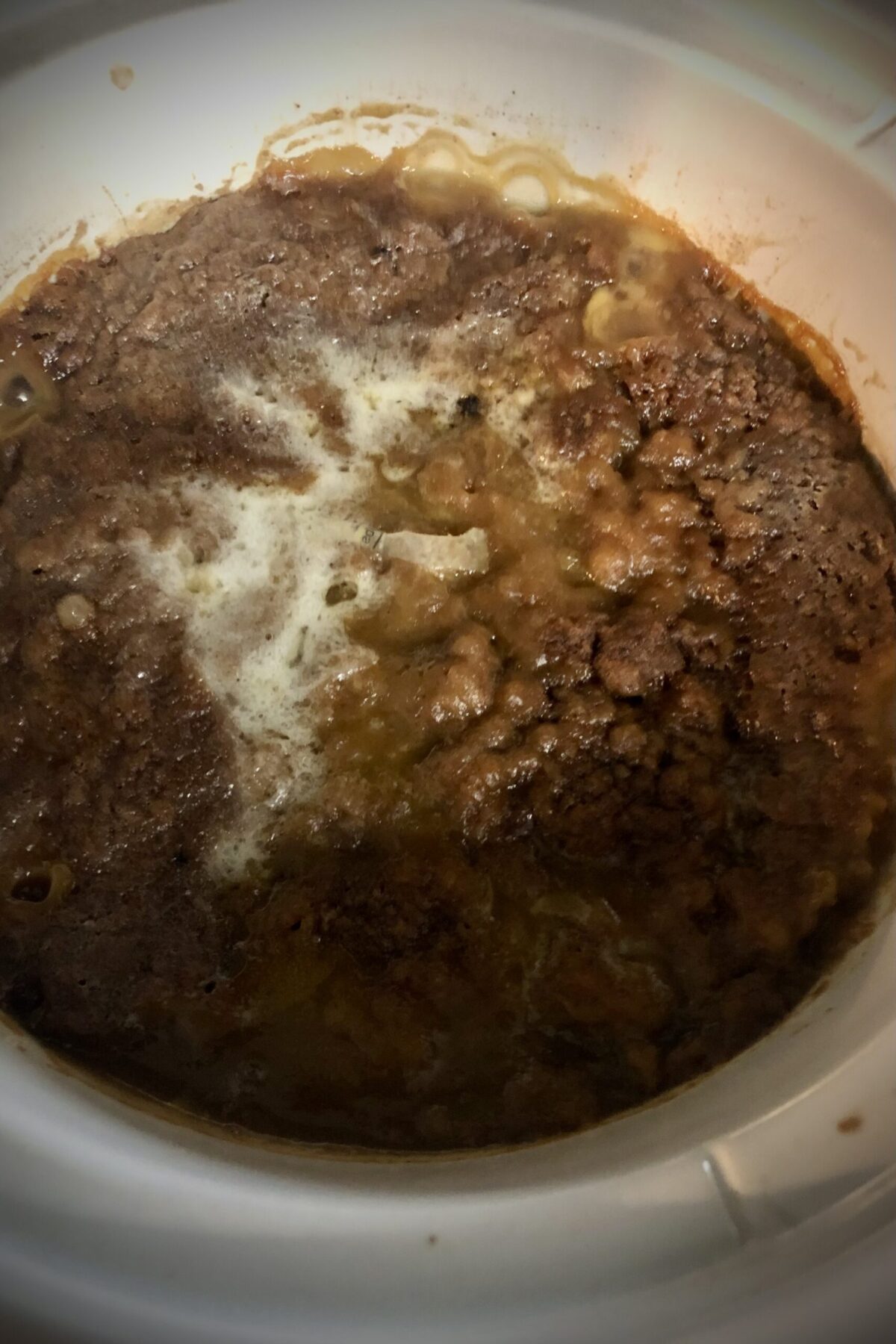 Cobbler has been cooking and butter has melted and has soaked in to the cake mix