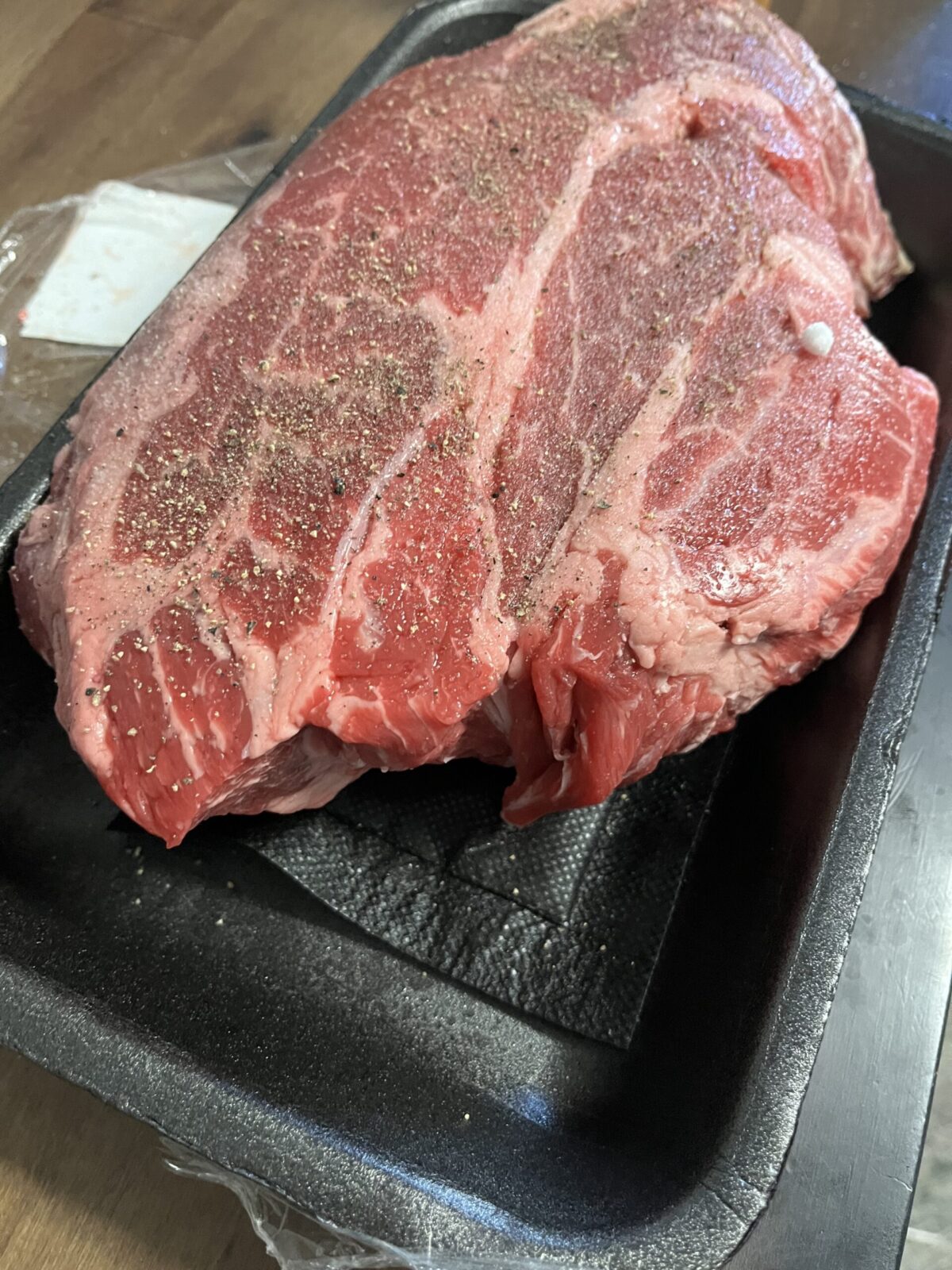 Roast has had salt and pepper added to it on all sides there one on big of salt that came out in a ball