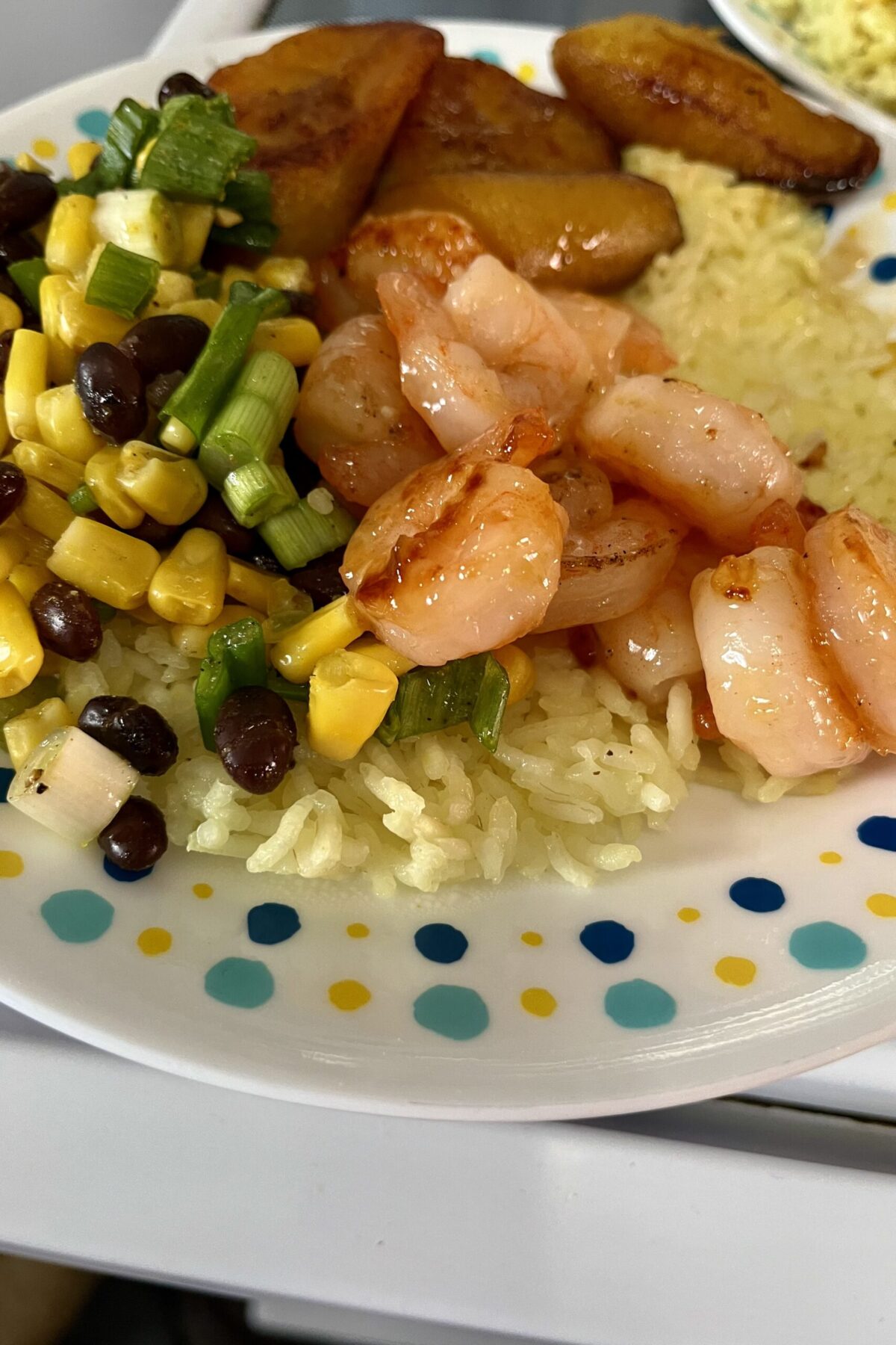 Everything has been completed together is ready to eat. The rice has a nice yellowish from the adobo for the Garlic shrimp rice bowl