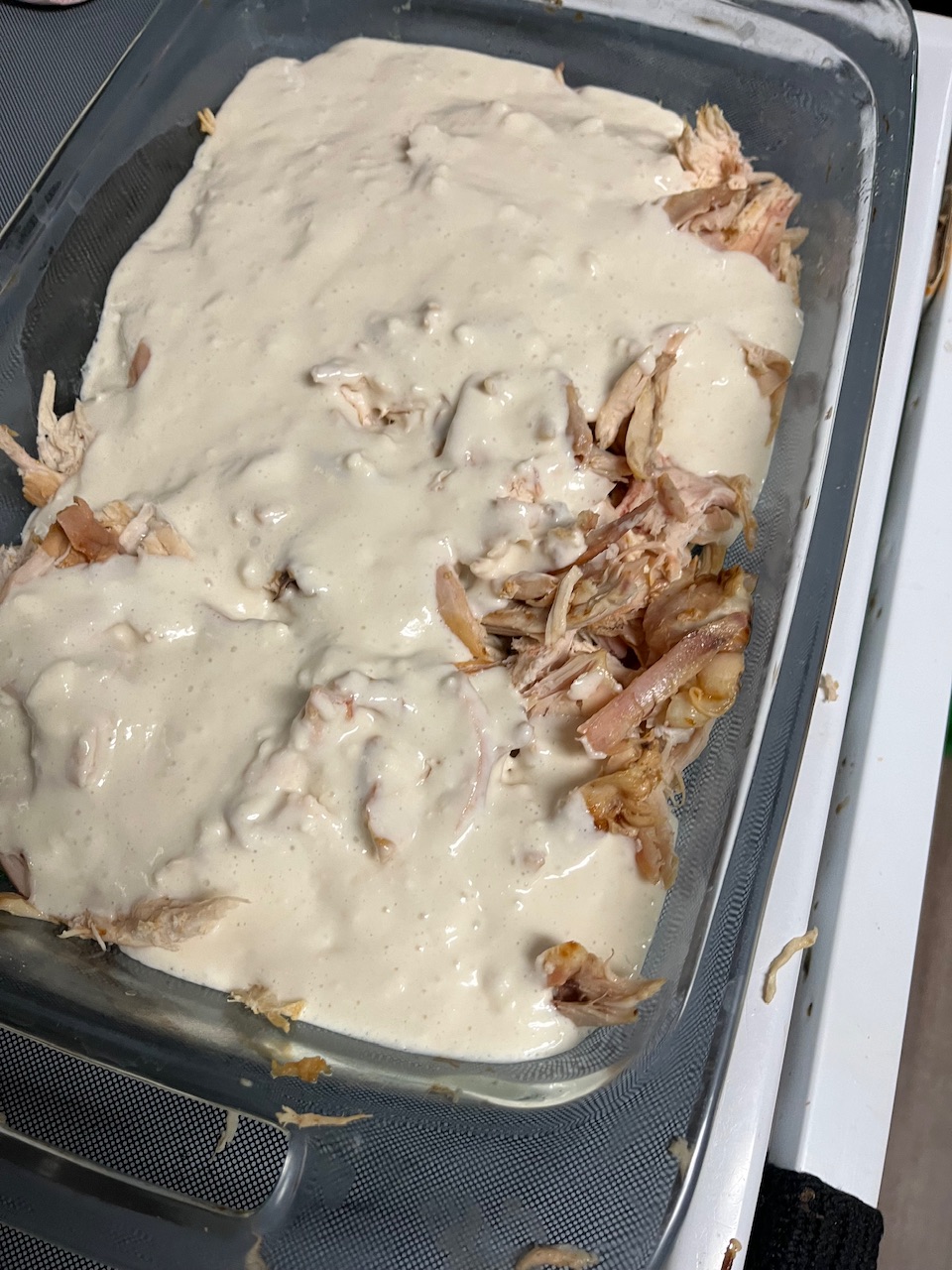 The best get mix has been poured over the chicken little bit of the chicken poking through. I forgot to have the vegetables before so you can’t see them cause they’re not there.