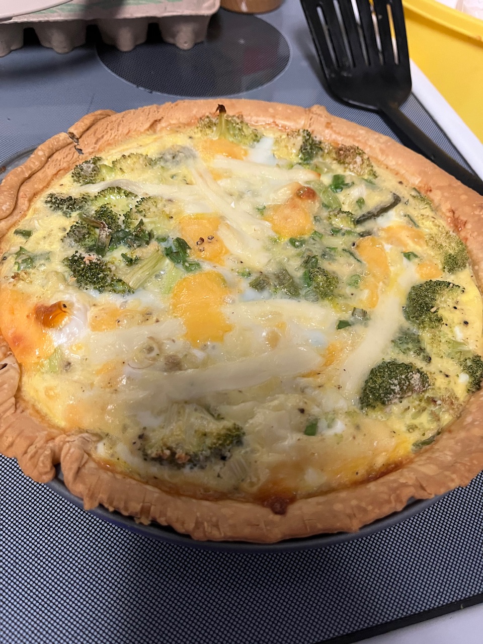 The quiche has been in the oven. She’s just melted and then make hearted cheese you couldn’t see the different mixture is popping through